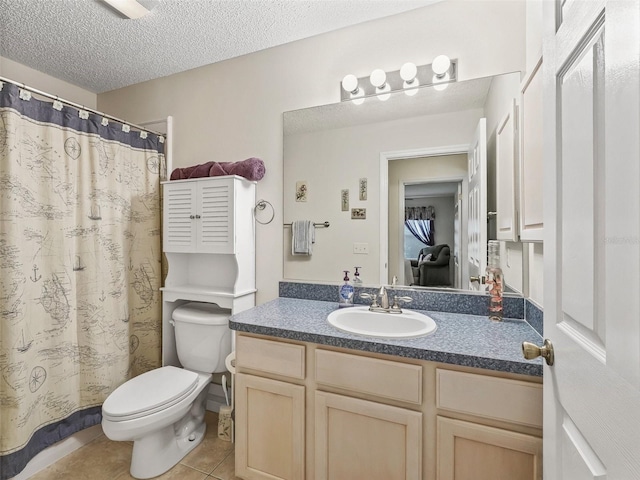 1307 Galindo Pl, The Villages, FL 32159 - bathroom with vanity, toilet, tile patterned flooring, and a textured ceiling