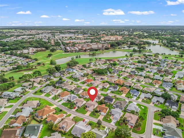 1307 Galindo Pl, The Villages, FL 32159 - birds eye view of property featuring a water view, a residential view, and golf course view