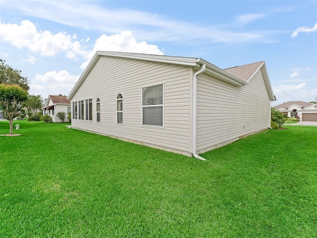 1307 Galindo Pl, The Villages, FL 32159 - view of side of home featuring a lawn