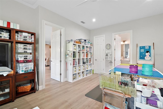 interior space featuring visible vents and wood finished floors