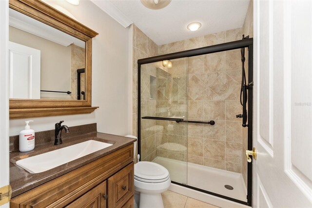 278 Matisse Ave, The Villages, FL 32162 - full bath with a shower stall, tile patterned floors, vanity, and toilet