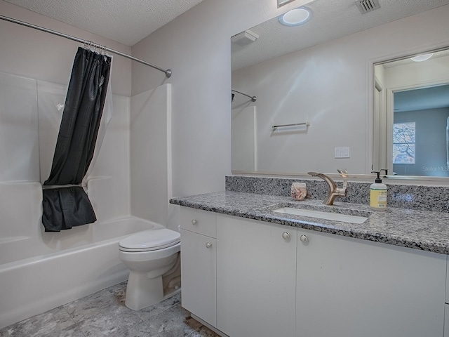 bathroom featuring a textured ceiling, vanity, shower / bath combination with curtain, toilet, and visible vents