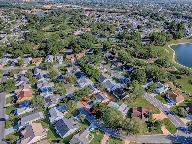 aerial view featuring a water view and a residential view