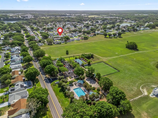birds eye view of property with a residential view