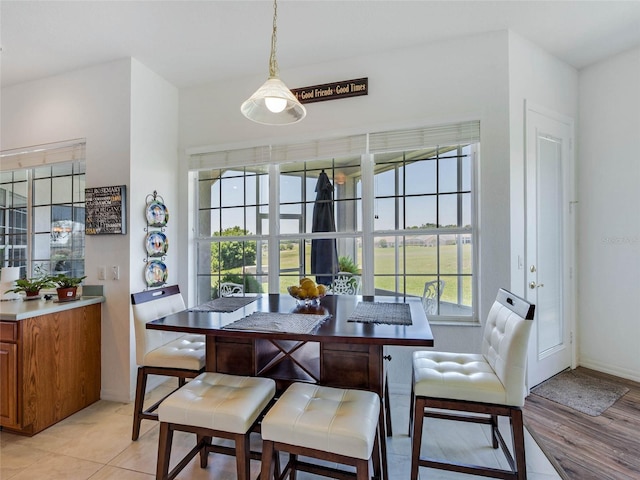 dining room with baseboards