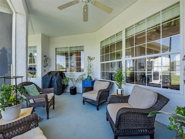 view of patio / terrace featuring ceiling fan