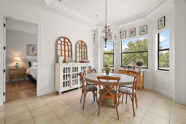 dining room featuring an inviting chandelier, baseboards, ornamental molding, and light tile patterned floors