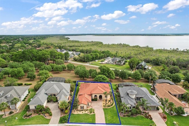 drone / aerial view featuring a water view