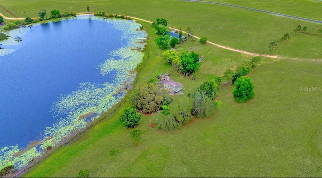 drone / aerial view featuring a water view and a rural view
