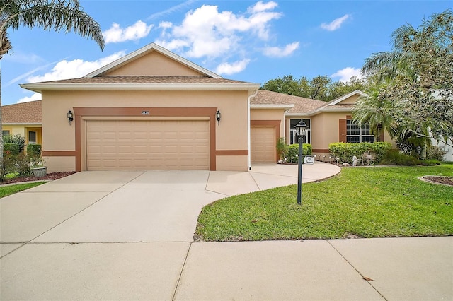 3828 Arbordale Ct, Leesburg, FL 34748 - single story home with driveway, a front lawn, a garage, and stucco siding