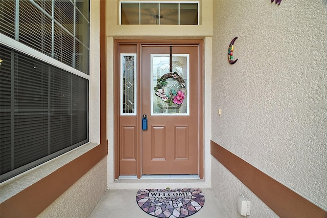 3828 Arbordale Ct, Leesburg, FL 34748 - view of exterior entry featuring stucco siding