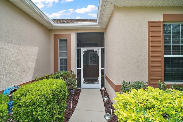3828 Arbordale Ct, Leesburg, FL 34748 - doorway to property featuring stucco siding