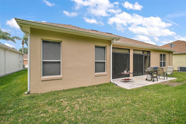 3828 Arbordale Ct, Leesburg, FL 34748 - back of property featuring a patio area, stucco siding, and a lawn