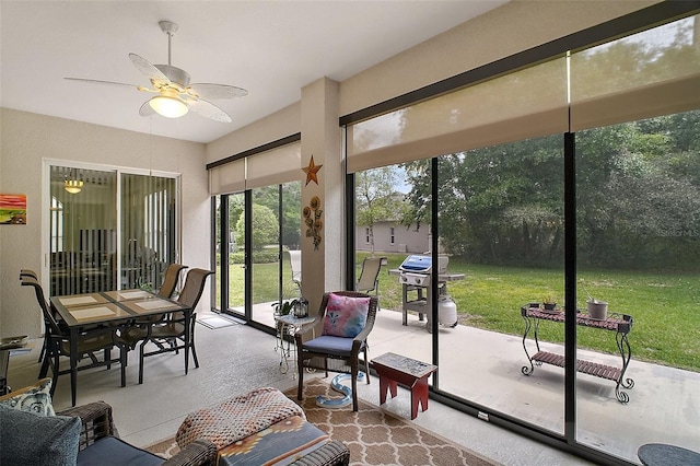 3828 Arbordale Ct, Leesburg, FL 34748 - sunroom with an outdoor living space, ceiling fan, and concrete flooring