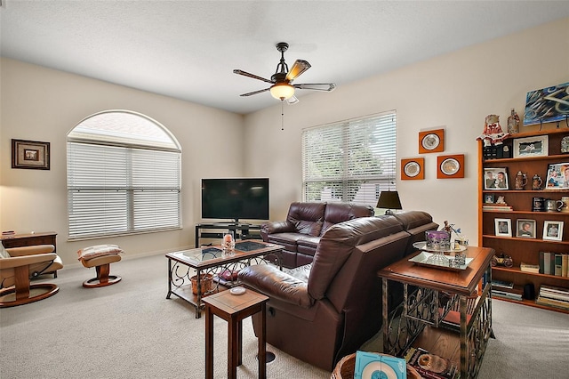3828 Arbordale Ct, Leesburg, FL 34748 - carpeted living area featuring ceiling fan and a wealth of natural light