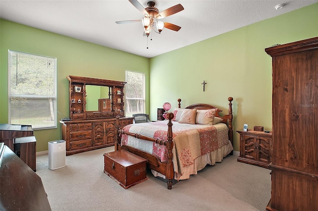 3828 Arbordale Ct, Leesburg, FL 34748 - bedroom featuring baseboards, multiple windows, a ceiling fan, and carpet floors
