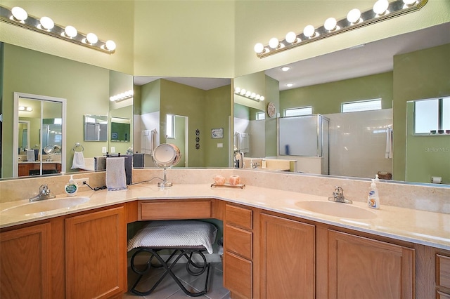 3828 Arbordale Ct, Leesburg, FL 34748 - bathroom featuring a shower stall, double vanity, and a sink