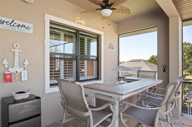 view of patio with a ceiling fan
