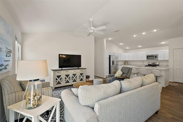 6248 Siverson Ter, The Villages, FL 32163 - living room with ceiling fan, dark wood finished floors, recessed lighting, lofted ceiling, and visible vents