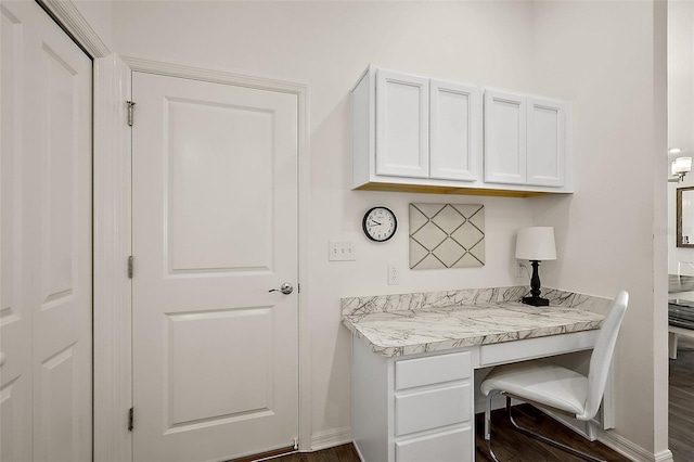 6248 Siverson Ter, The Villages, FL 32163 - office area with dark wood-style flooring and built in study area