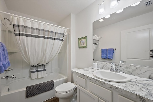 6248 Siverson Ter, The Villages, FL 32163 - full bath with vanity, shower / bath combo, toilet, and visible vents