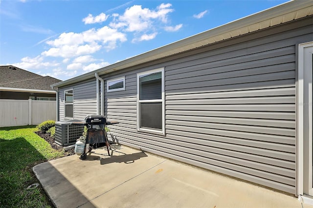 6248 Siverson Ter, The Villages, FL 32163 - view of patio featuring fence and a grill