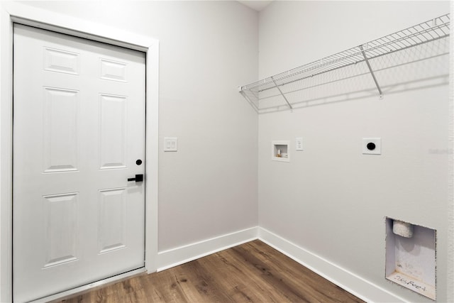 laundry room with laundry area, baseboards, dark wood-type flooring, electric dryer hookup, and washer hookup