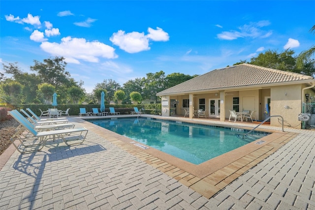 9081 Saint Andrews Way, Mount Dora, FL 32757 - community pool featuring a patio