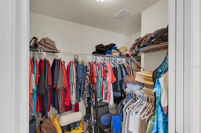 walk in closet featuring visible vents
