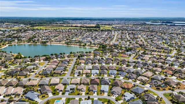 aerial view featuring a water view and a residential view