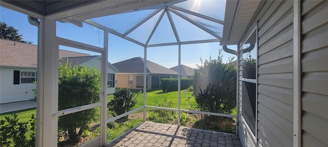 unfurnished sunroom featuring plenty of natural light
