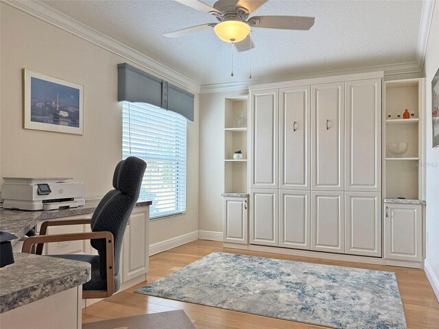 3325 Archer Ave, The Villages, FL 32162 - home office with light wood-style floors, a ceiling fan, crown molding, a textured ceiling, and baseboards