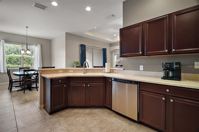 10021 Lake Miona Way, Oxford, FL 34484 - kitchen with a peninsula, light countertops, visible vents, stainless steel dishwasher, and a sink