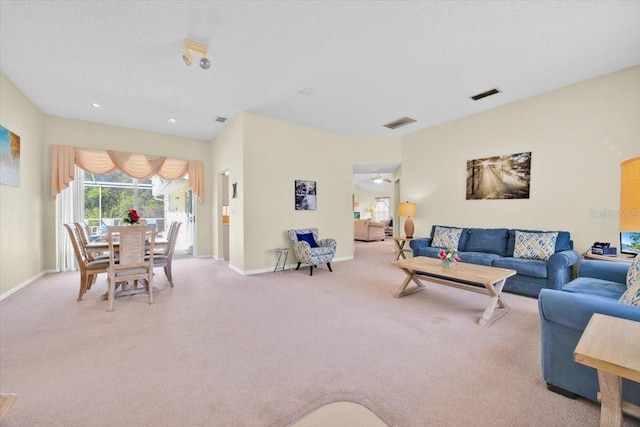2855 Picadilly Cir, Kissimmee, FL 34747 - carpeted living room featuring baseboards