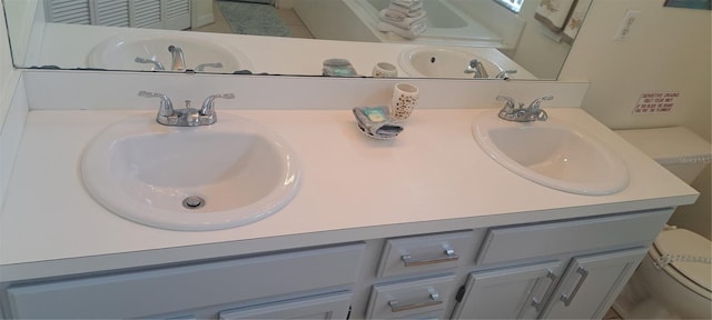 2855 Picadilly Cir, Kissimmee, FL 34747 - full bath with double vanity and toilet