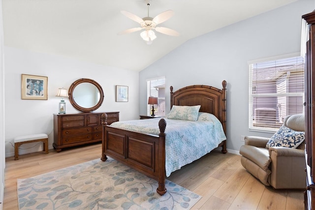 bedroom featuring vaulted ceiling, a ceiling fan, light wood finished floors, and baseboards