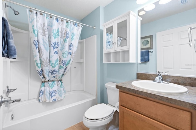full bathroom with visible vents, vanity, shower / bathtub combination with curtain, and toilet