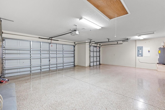 garage with water heater, a garage door opener, electric panel, and baseboards