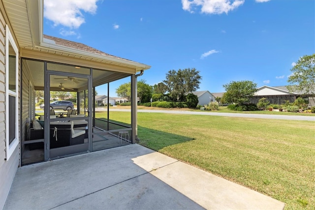 view of patio featuring a sunroom