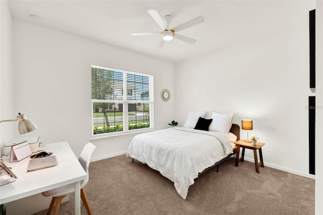 bedroom with carpet flooring, baseboards, and ceiling fan