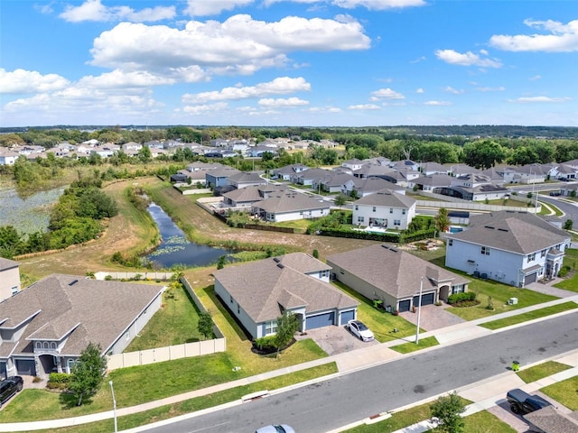 aerial view featuring a water view and a residential view
