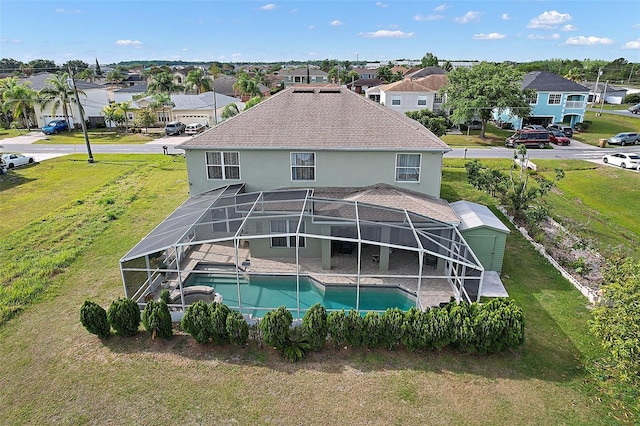 54 Andora Ct, Kissimmee, FL 34758 - pool featuring a yard, a residential view, and glass enclosure