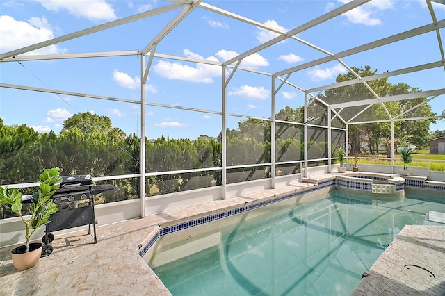 54 Andora Ct, Kissimmee, FL 34758 - view of pool with a pool with connected hot tub, a patio, area for grilling, and a lanai