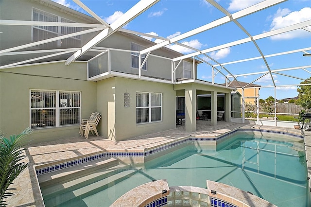 54 Andora Ct, Kissimmee, FL 34758 - view of pool featuring a patio area, a fenced in pool, a hot tub, and glass enclosure