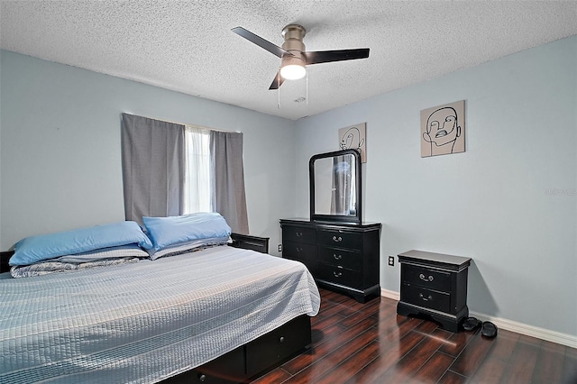 54 Andora Ct, Kissimmee, FL 34758 - bedroom with baseboards, a textured ceiling, a ceiling fan, and wood finished floors