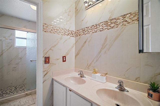 54 Andora Ct, Kissimmee, FL 34758 - bathroom with a shower stall, double vanity, and a sink
