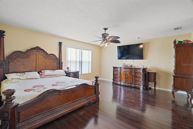 54 Andora Ct, Kissimmee, FL 34758 - bedroom featuring visible vents, baseboards, a ceiling fan, a textured ceiling, and wood finished floors