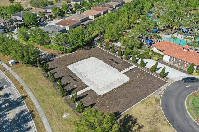 birds eye view of property with a residential view