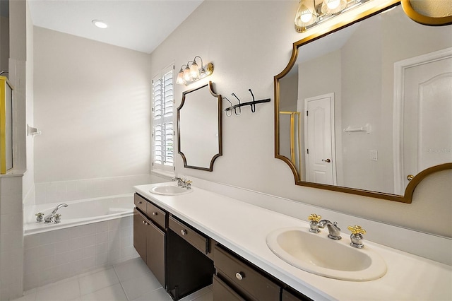 bathroom with tile patterned flooring, double vanity, a bath, and a sink