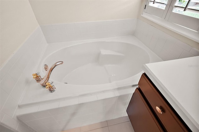 full bathroom featuring vanity and a bath